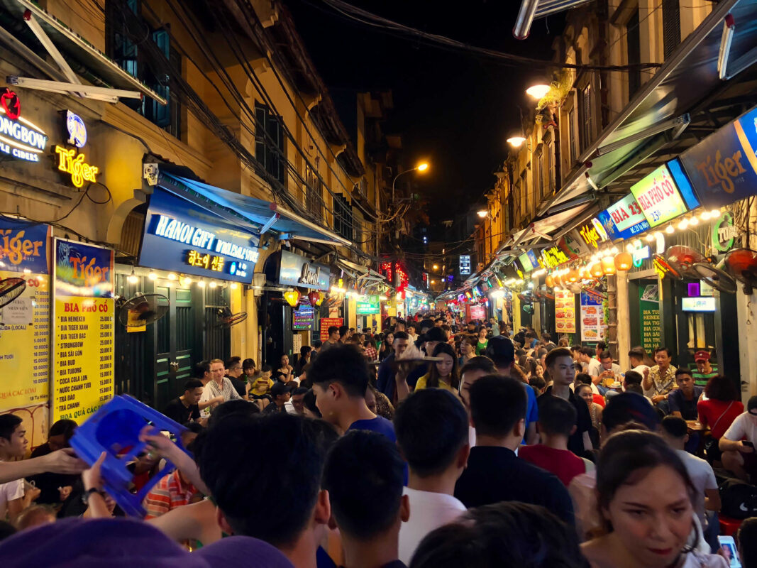 Ta Hien Street nightlife with tourists and lights in Hanoi
