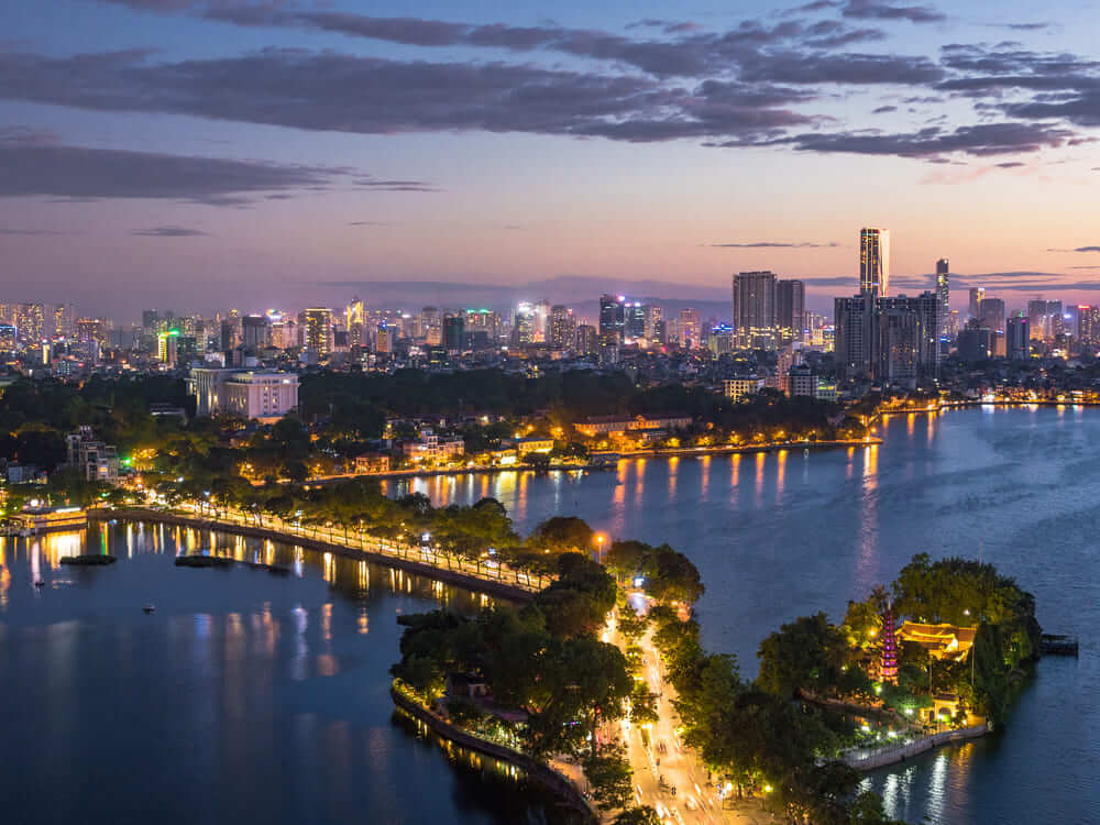 Tran Quoc Pagoda at night shining over West Lake